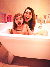 Luisa Zissman poses naked in the bath with adorable three-year-old daughter Dixie